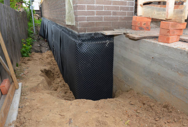 Happy homeowners after waterproofing job in Bergenfield